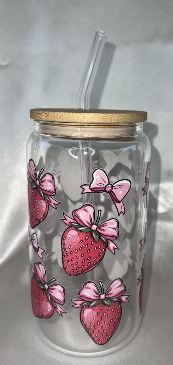 Strawberry with bow,clear glass can.